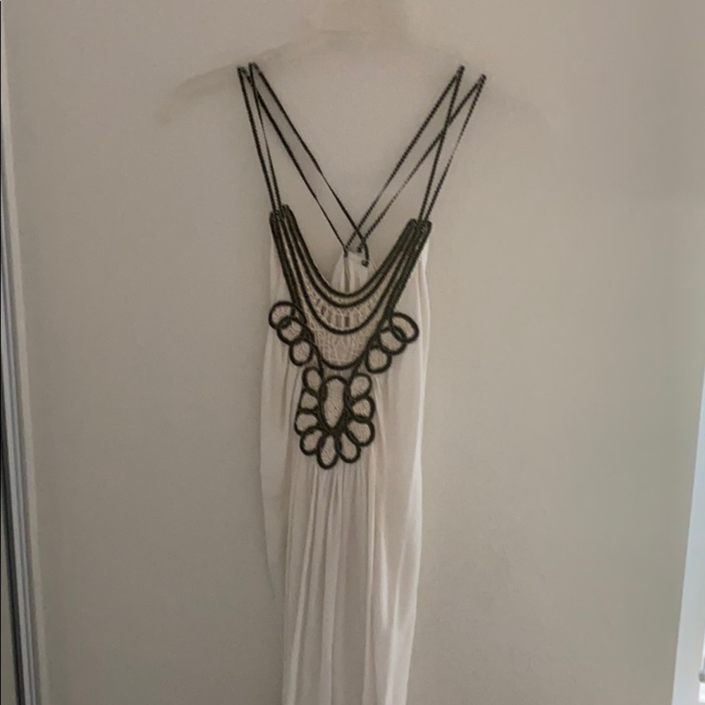 White tunic with cross back and beautiful details